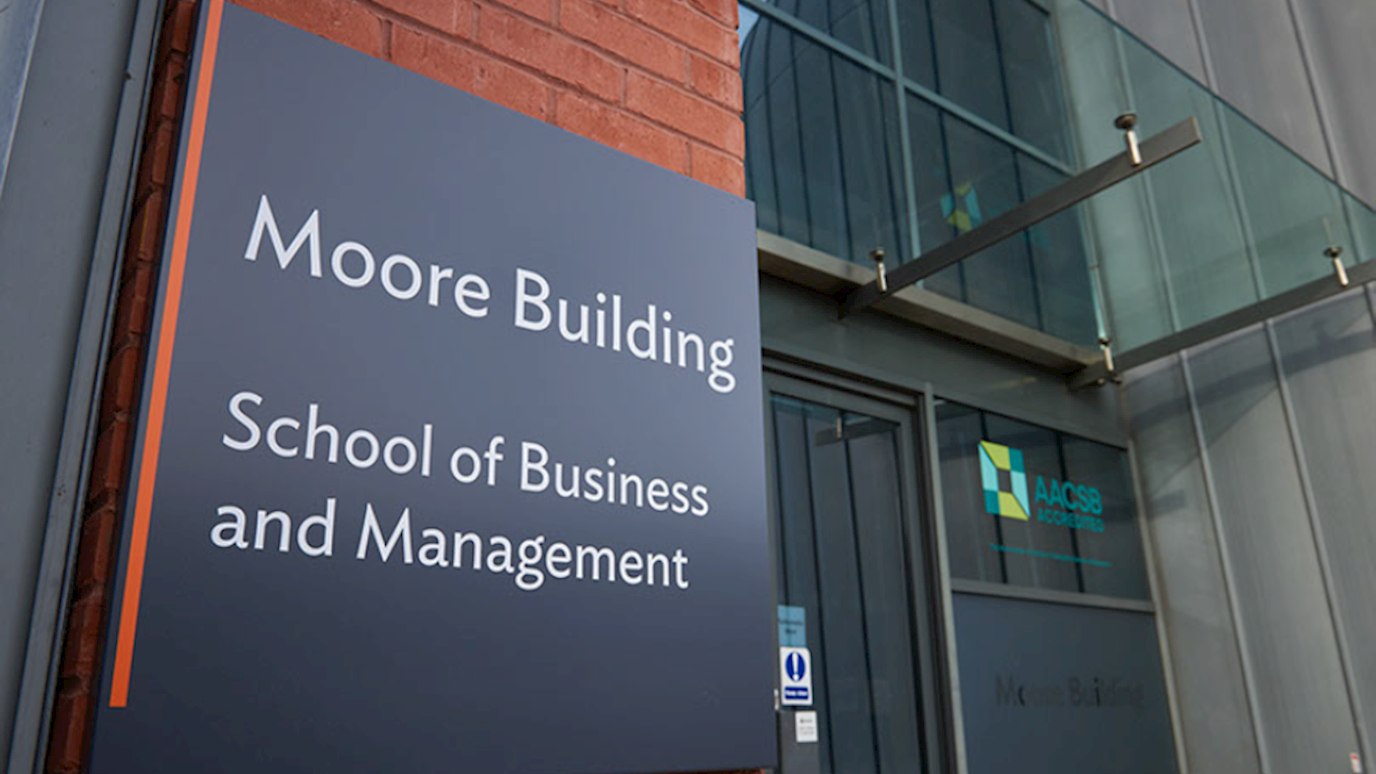 RHUL SoBM Moore Bdg sign